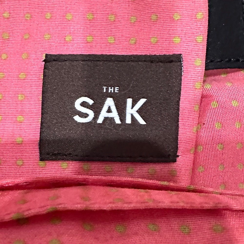 The SAK Chic Black Tote Bag with Pink and Lime Green Polka Dot Interior - Picture 2 of 16